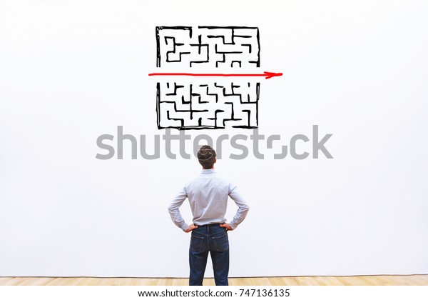 problem and solution concept, business man\
thinking about exit from complex\
labyrinth