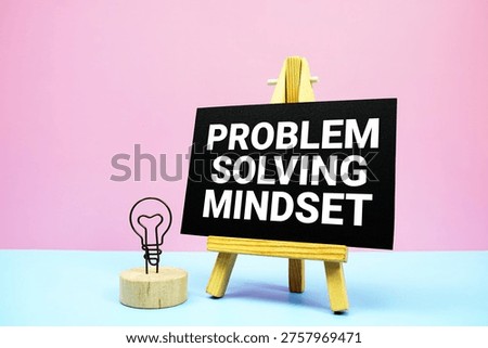 Problem Solving Mindset text written on wooden easel stand