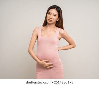 Problem with structural posture neck and shoulders neck pain Pregnant asian woman stroking touch belly motherhood on isolated background. Family planning maternity and pregnancy health.