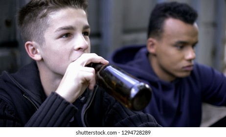 Problem Teenagers Secretly Drinking Beer, Skipping School Classes, Hooligans