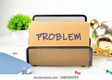 PROBLEM word written on a postal envelope in a stand on a white background
