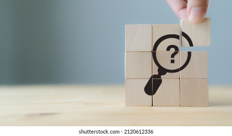 Problems and root cause analysis concept. Define problems to find solution. The wooden cubes with illustration magnifying glass to analyze question mark sign on grey background and copy space. - Shutterstock ID 2120612336