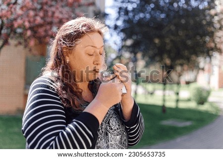 Problems with smoking. Overweight depressed woman smokes outside to calm down. Hormonal failure. Problems with obesity. Lonely people. Mental health. Mental problems. Stress, panic, fear.