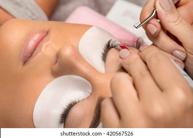 Procedure of eyelashes extension in salon