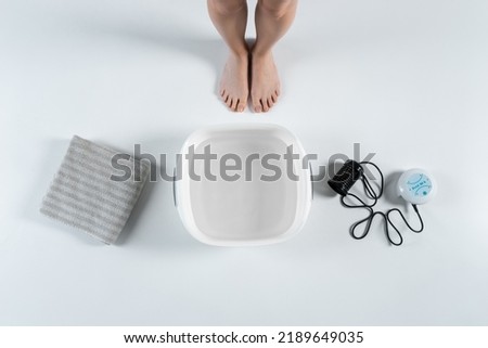 procedure of ionic detox foot bath machine in spa beauty center isolated