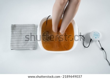 procedure of ionic detox foot bath machine in spa beauty center isolated