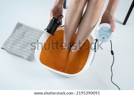 procedure of ionic detox foot bath machine in spa beauty center isolated