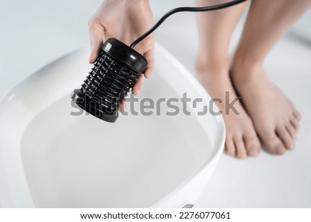 procedure of ionic detox foot bath machine in spa beauty center isolated