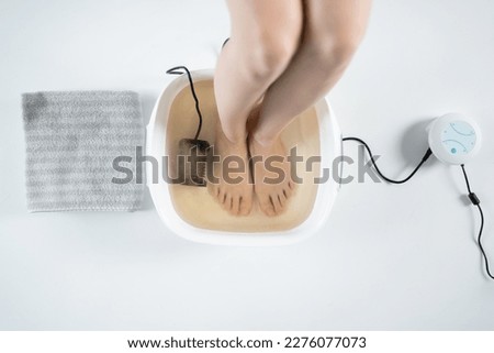 procedure of ionic detox foot bath machine in spa beauty center isolated