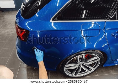 Process of applying a nano-ceramic coating on the car's. Protection the car body from scratches, chips and damage. 