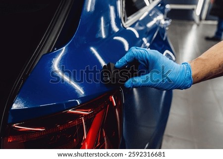 Process of applying a nano-ceramic coating on the car's. Protection the car body from scratches, chips and damage. 