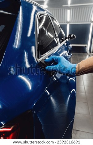 Process of applying a nano-ceramic coating on the car's. Protection the car body from scratches, chips and damage. 