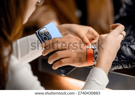The process of attaching a security bracelet to an event attendee's wrist during registration. The administrator places a paper bracelet on the guest's hand.