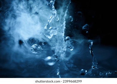 The process of boiling water, a stream of water shooting out of a humidifier or diffuser taken in close-up.