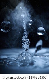 The process of boiling water, a stream of water shooting out of a humidifier or diffuser taken in close-up.