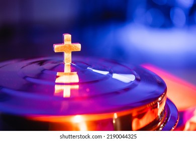 The Process Of Breaking Bread In The Modern Church. Breaking Bread Ceremony In Protestant Church. Religious Tradition Of Breaking Bread. Bread And Wine.