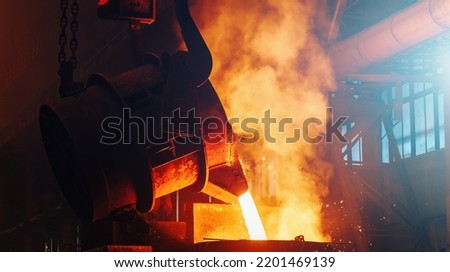 Process of Casting in Foundry. Steel Mill metallurgical Factory. Molten metal. Heavy Industry