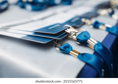 Process of checking in on conference congress forum event, registration desk table, visitors and attendees receiving lanyard with name badge and entry wristband bracelet and register electronic ticket - Powered by Shutterstock