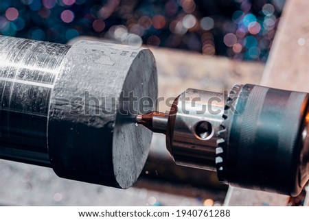 Process CNC lathe machine cutting metal. Modern industrial iron automotive technology.