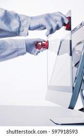 Process of computer repair. Engineer in white gloves disassembling computer.