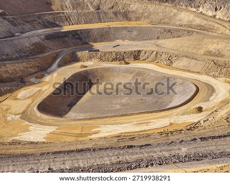 process of constructing earthen pits to be covered with geosynthetics at the bottom of mines