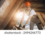 Process of construction new and modern modular house. Worker man in special protective uniform wear working on building development industry of energy efficient property.