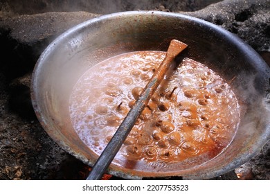 Process Of Cooking Rendang With Pan And Firewood. Its Produced From A Long Low-temperature Cooking Process Using Various Spices And Coconut Milk,authentic Indonesian Meat Originating From West Sumatra