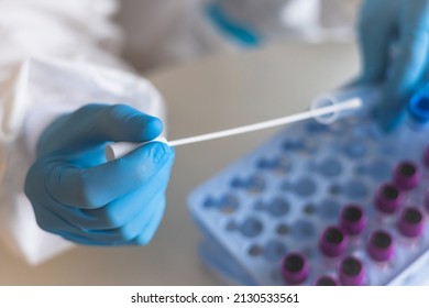 Process Of Coronavirus PCR Antigen Testing Examination By Nurse Medic In Laboratory Lab, COVID-19 Swab Collection Kit, Test Tube For Taking OP NP Patient Specimen Sample, Patient Receiving A Test