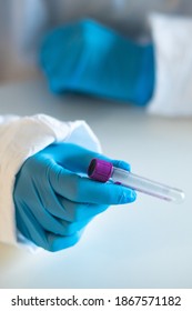 Process of coronavirus testing examination by nurse medic in laboratory lab, COVID-19 swab collection kit, test tube for taking OP NP patient specimen sample, patient receiving a corona test
