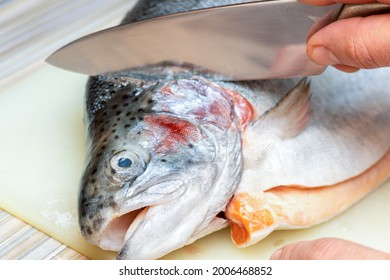 The Process Of Cutting With A Knife Trout, Salmon Fish Head