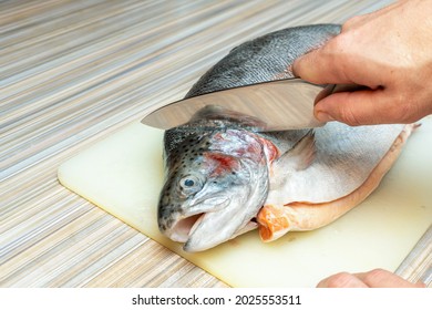 The Process Of Cutting With A Knife Trout, Salmon Fish Head