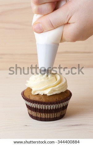 Similar – Image, Stock Photo Cupcake baking Dessert