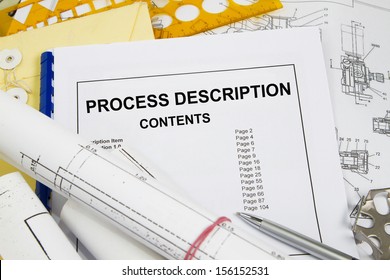 Process description brochure with blueprint and pencil
