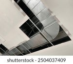 a process of HVAC ducting work above a ceiling