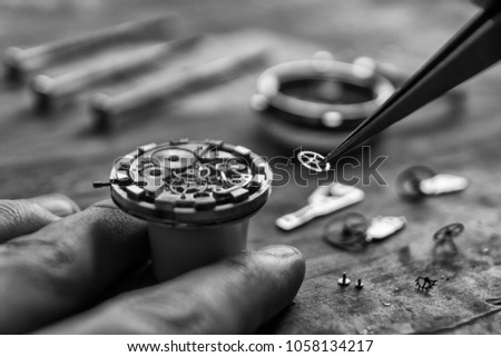 Process of installing a part on a mechanical watch, watch repair