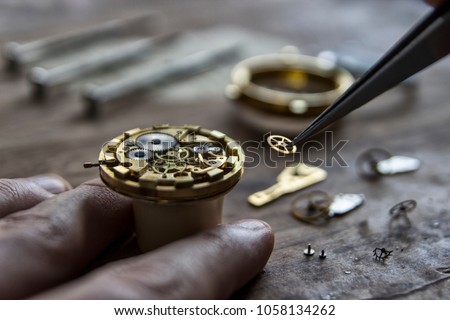 Process of installing a part on a mechanical watch, watch repair