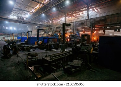 Process of Iron pipe casting at the foundry. - Powered by Shutterstock