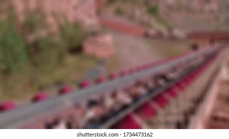 process loading coal mining from crusher to jetty conveyor.blurry background