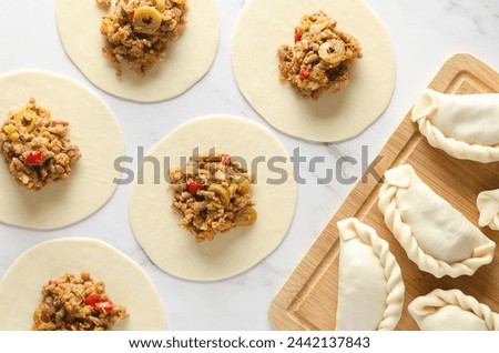 The process of making Argentinian beef empanadas.
