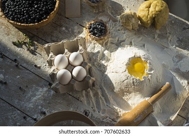 Process Of Making Blueberry Pie. The Ingredients On A Wooden Table. Top View.