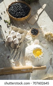 Process Of Making Blueberry Pie. The Ingredients On A Wooden Table. Top View.