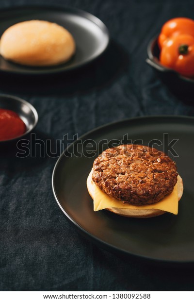 Process making of burger, step by step isolated on\
black background. Burger wide banner. Split burger. Burger divided\
in parts