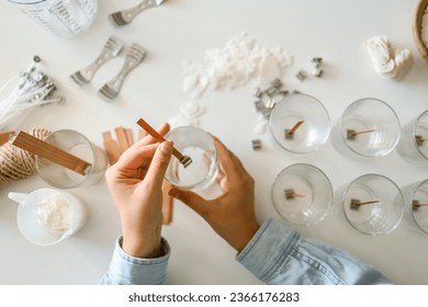 Process of making candles in a workshop.