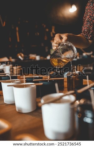 The process of making candles in the workshop.