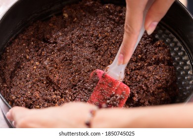 The Process Of Making A Cheesecake Crust. Close-up.