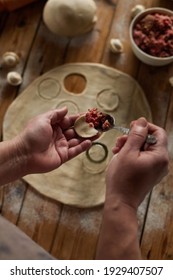 The process of making dumplings, hand molding, home cooking. Russian national cuisine - Shutterstock ID 1929407507