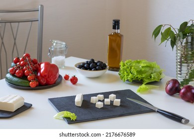 The Process Of Making Greek Salad. Pieces Of Cheese.