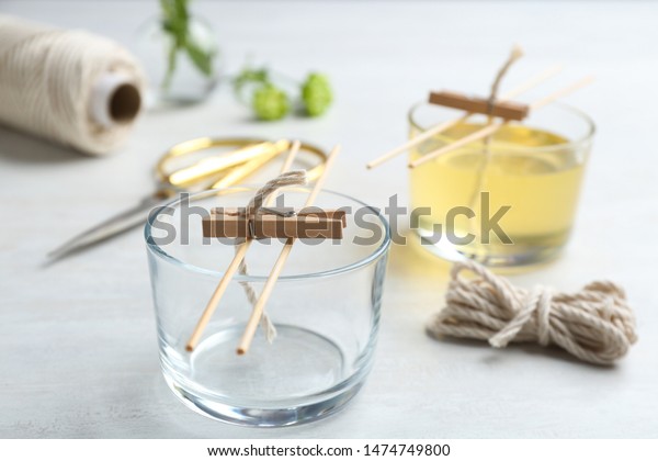 Process of making\
homemade candle on\
table