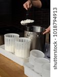 process of making home-made cheese in the workshop