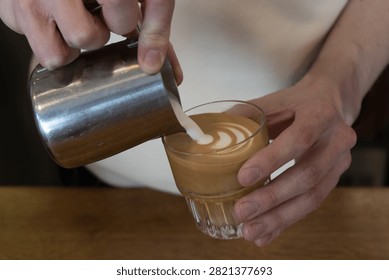 the process of making a latte in the coffeeshop